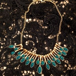 Gold and green stoned necklace